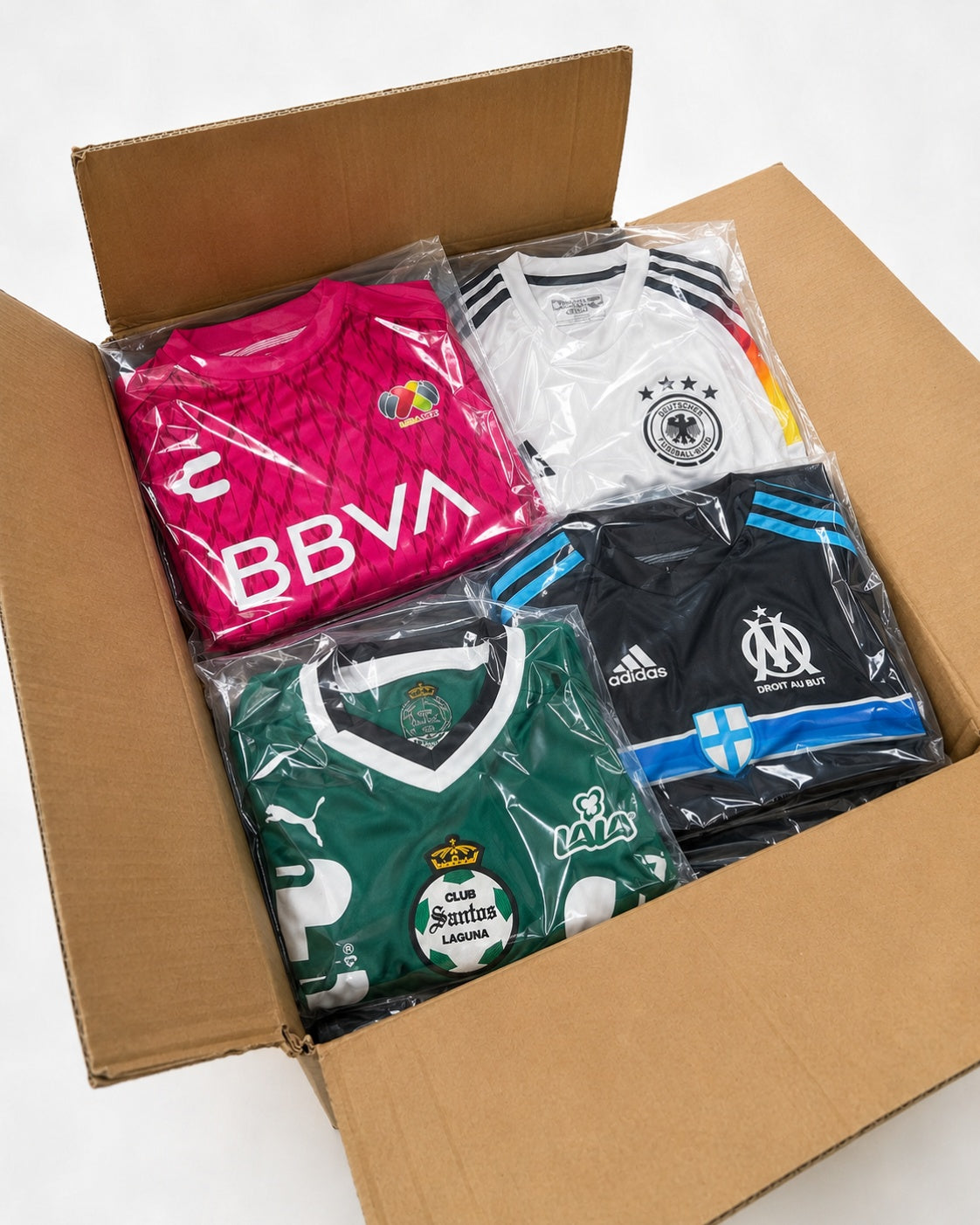 Mr. E Kit football shirts in clear bags from a stock batch